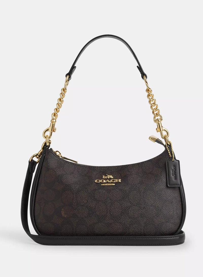 كوتش اوت ليت حقيبة كتف نسائية من Coach Teri مصنوعة من قماش مميز، حقيبة يد نسائية، حقيبة هوبو نسائية، حقيبة توت نسائية، حقيبة سفر نسائية، لون الجوز الأسود 24 سم - Image 1